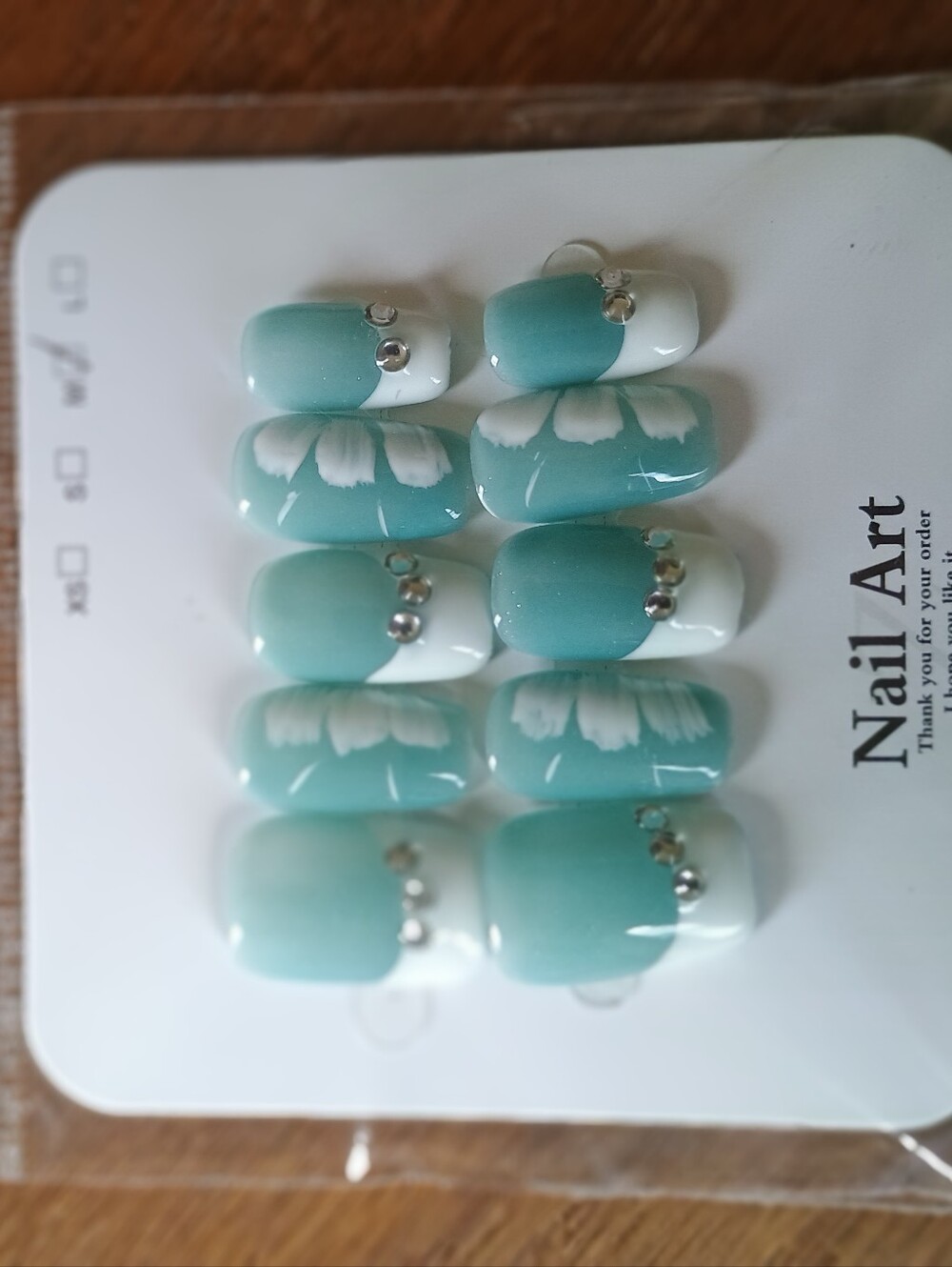 Aqua Ombre French Tip Press-On Nails with White Floral Accent